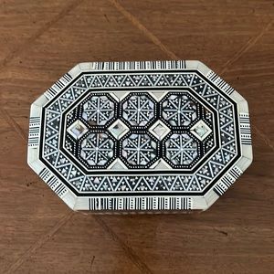 Small Used Jewelry Box with pearlescent inlay on the top.